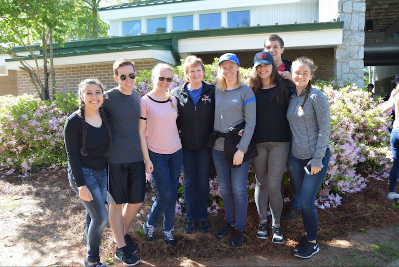 	(L-R) Vocal sophomore Alexa Burnston, vocal juniors Jared Freedland and Lauren Healey, vocal director Arlene Sparks, vocal juniors Morgan Healey, Makayla Forgione, Noah Gunn, and Alexandra Slusarenko at the WorldStrides Onstage Competition in Atlanta, Ga. The choir walked away with a first place victory, as well as adjudicators choice.