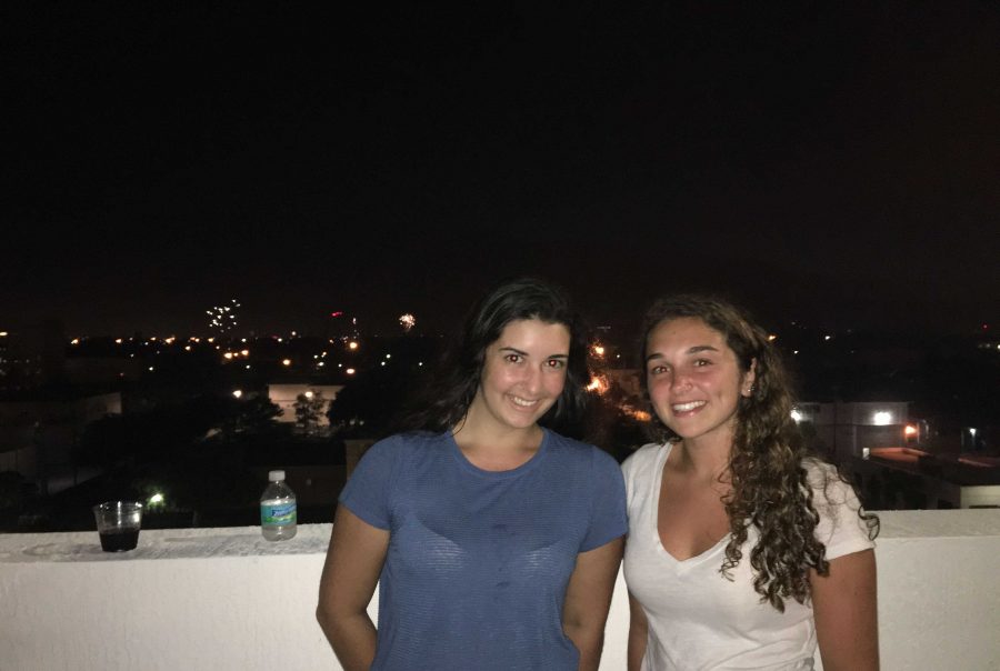 Communications sophomore Gabby Moragues (left) and senior Alana Gomez spend their Fourth of July watching the fireworks in Palm Beach.
