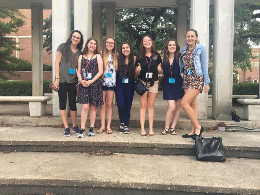 Vocal juniors Sarah Haughn (second from left) and Alexa Burnston (middle) pose with their newfound friends at FSU Choral Ensemble Camp in Tallahassee, Florida. “It was an amazing experience,” said Burnston. “For a week, I feel like I truly got to live the life of a college student, minus the academic pressure and lack of money.”