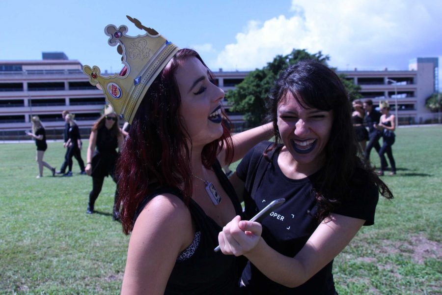 Theatre seniors Suzanne Litwinka and Aly Mazzie share a laugh after taking a class photo with the graduating class of 2017. Today marks the second Senior Blackout Day for this class, with all seniors dressing in black to celebrate their future graduation.