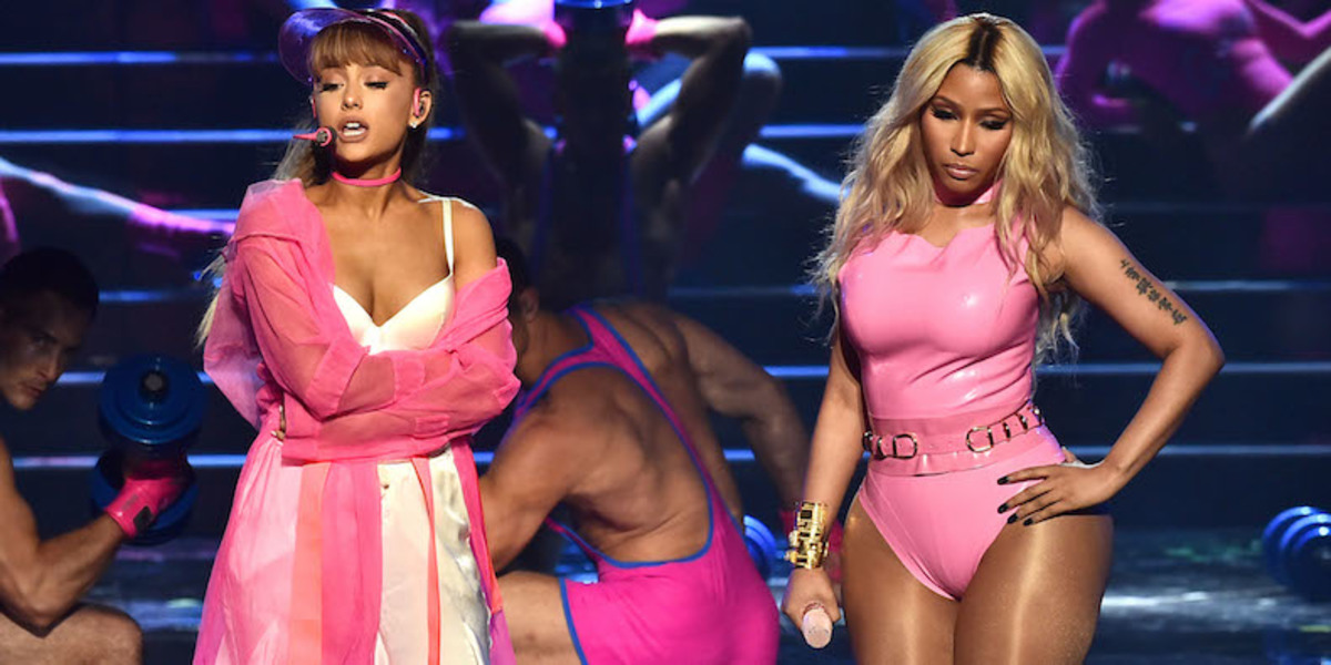 Ariana Grande and Nicki Minaj perform “Side to Side” on a stage themed around a gym.