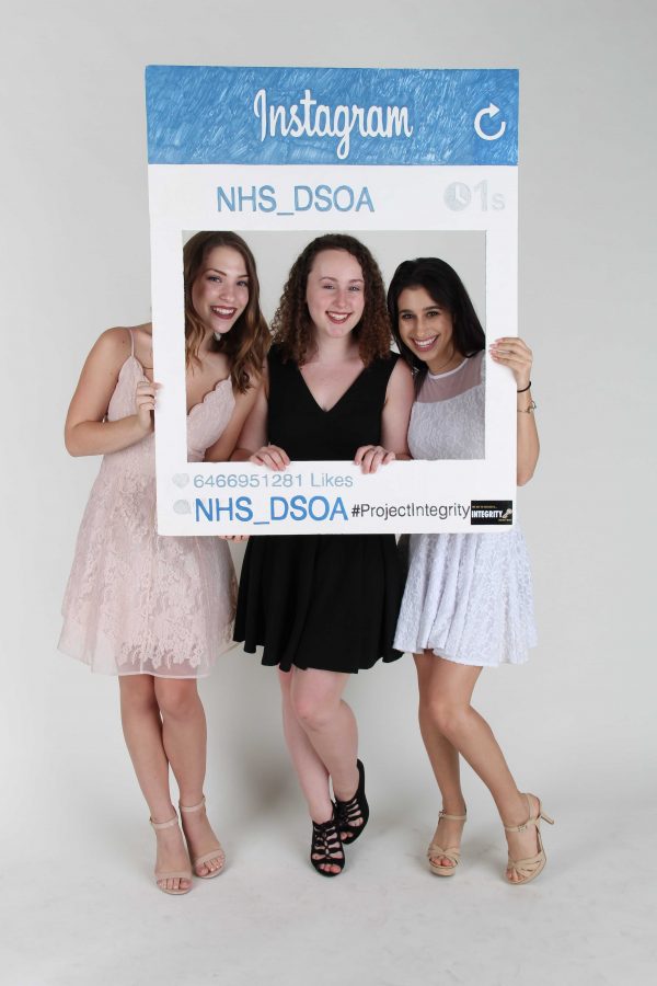 Posing for a photo, theater juniors (L-R) Skyler Sajewski, Aleah Beche, and Zoey Burger celebrate their induction into the National Honor Society on Sept. 30.