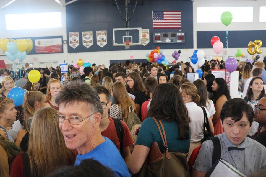 Students+and+teachers+alike+crowd+into+the+gym+for+Dreyfoos%E2%80%99+annual+Club+Rush+held+this+year+on+Sept.+20.