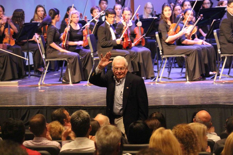 School founder Alexander Dreyfoos waves to the crowd in Meyer Hall after receiving a shoutout by strings dean Wendell Simmons. Mr. Dreyfoos was among the packed group of students, parents, and administrators in attendance at the Philharmonic Orchestra. 