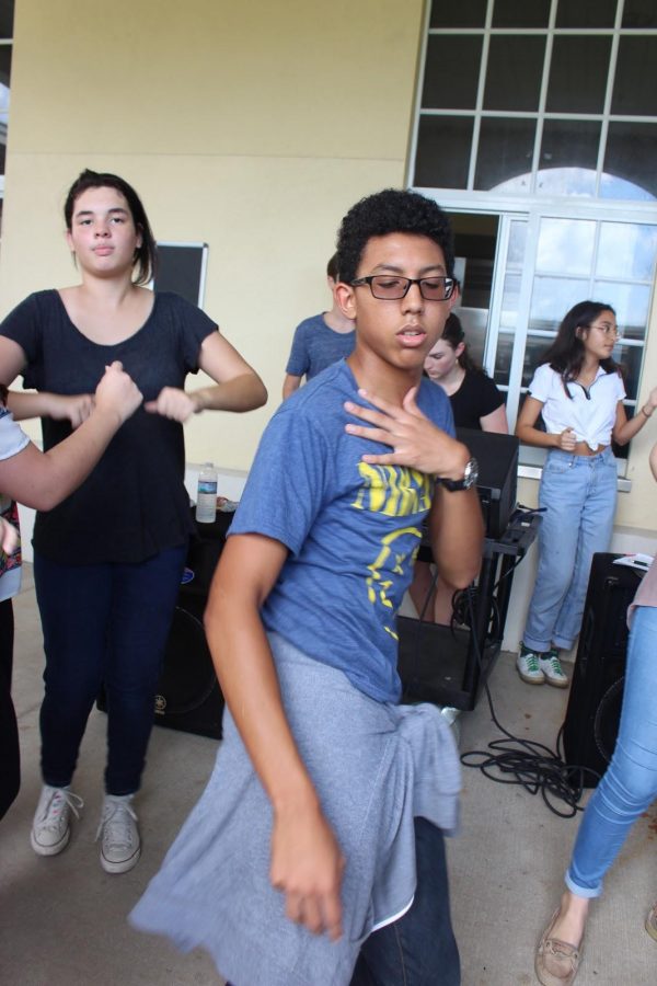 Band junior Samuel Calzada dances to the music provided by the Latin Hispanic Heritage club.  Club member Catalina Correa said, “The LHHC fiestas are always fun and a good way for people to get a taste of what we’re all about.”