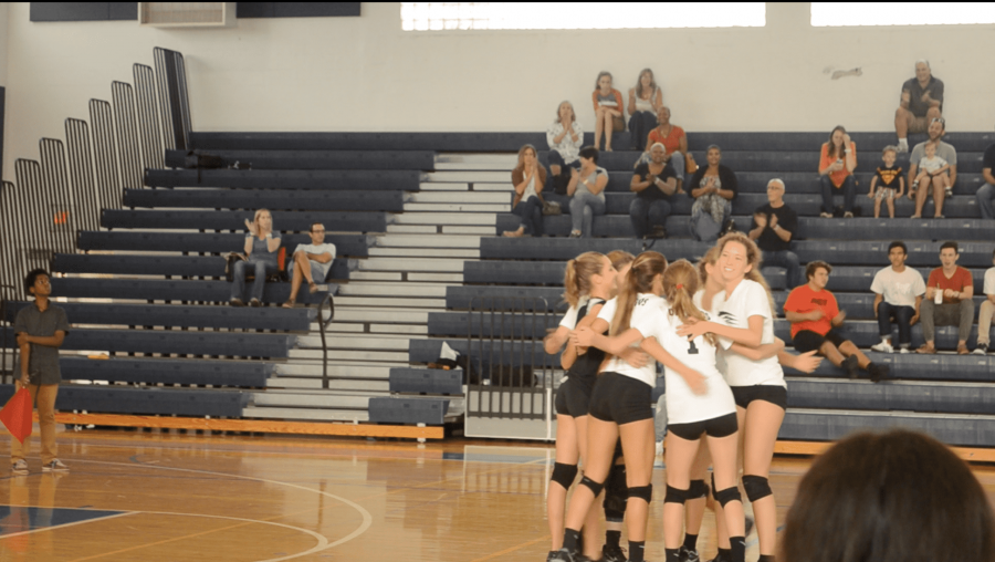 Dreyfoos celebrates a point in their win against Port St. Lucie High School.