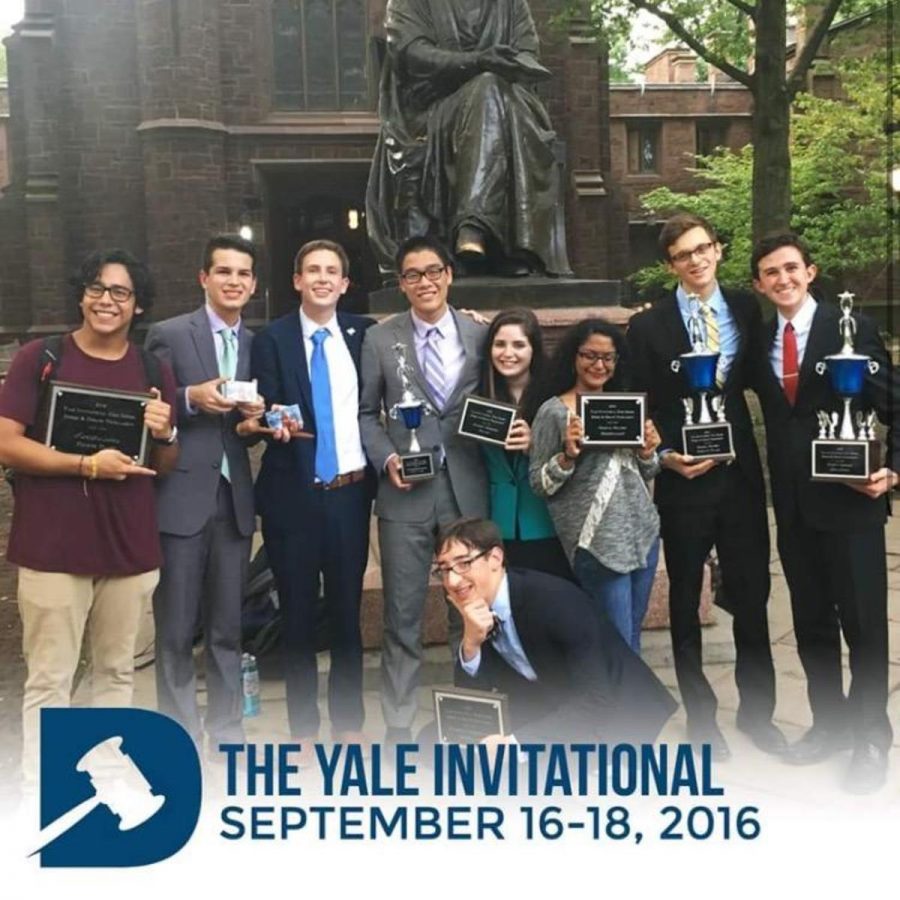 Social studies teacher (L-R) Javier Mora, communications sophomore Michael Bole, former vocal sophomore Luke Tillitski, communications senior Jack Yan, junior Maya Levkovitz, senior Anjelica Abraham, senior Matt Nadel, junior Alexander Gordon, and digital junior Joshua Meredith pose with their awards. The Dreyfoos debate team competed at the Yale Invitational and placed fourth in tournament sweepstakes in New Haven, Connecticut. 