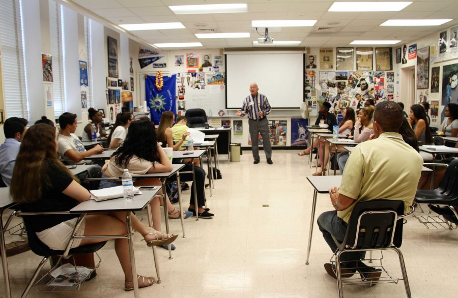 Social studies teacher Jeffrey Stohr and his students listen to former Congress member, Mark Foley. Foley was honest; nothing was sugar coated. His presentation not only shed light on this election, but also gave a perspective that was not worried about trying to convince voters or fear losing them; it was the truth,  said communications senior Carsen Jessell