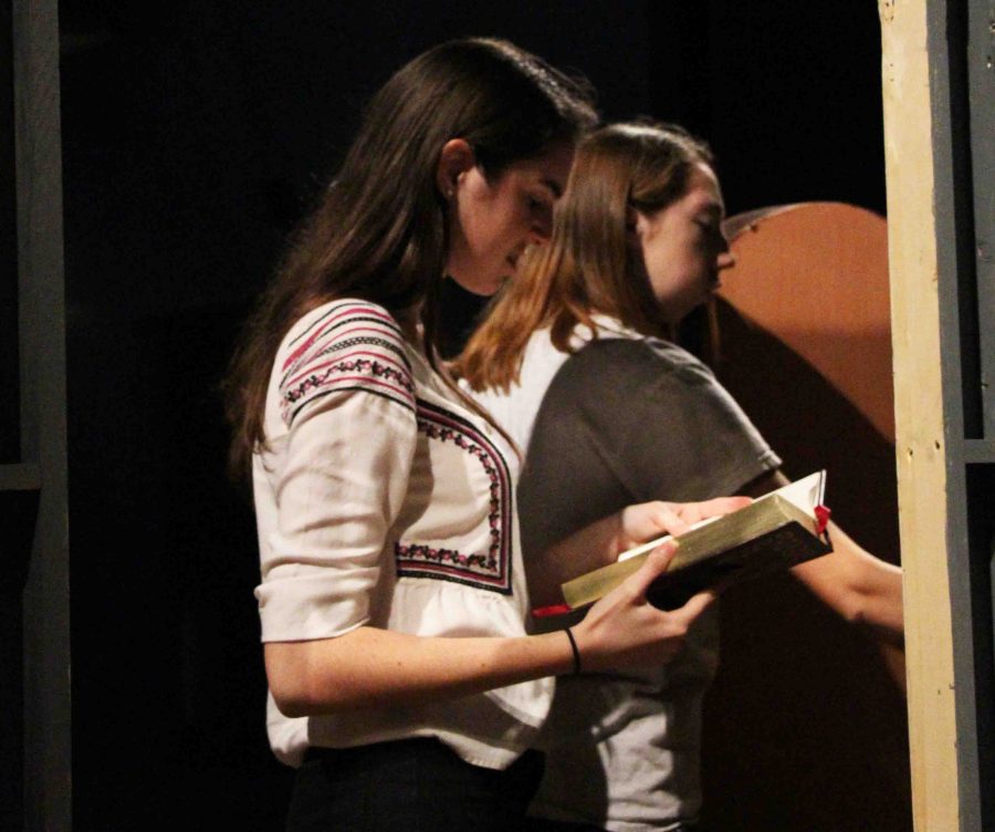  (L-R) Theatre junior Sidney Rubinowicz and theatre senior Cami Wright work on The Addams Family set. The show runs Oct. 28th through Nov. 6th.