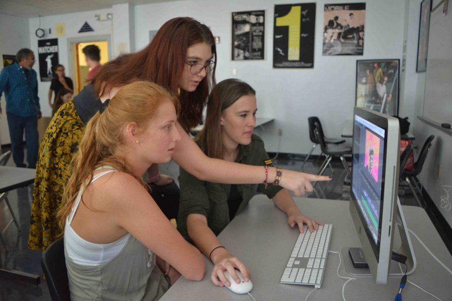 [L-R] Digital Media junior Vanessa Ritota and communications juniors Gina Givens and MLE Dejaco edit a film project. Film is a collaborative art and Im glad to be a part of such an amazing team, Ritota said.