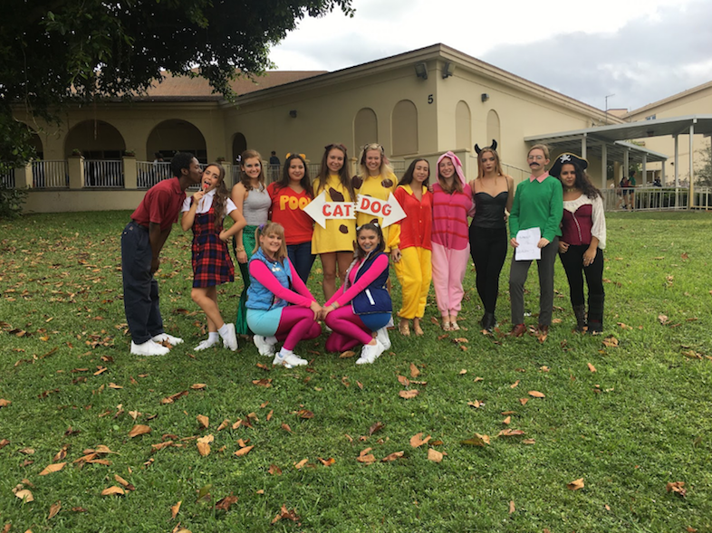 A group of friends get together to take a group picture on Freshman Hill after going to the Fall Festival held in gym. Vocal junior Christian Thompson, (L-R top row) dance juniors Maddy Gallo and Allison Cavanagh, piano major Adriana Sabat, dance juniors Jordan Maurer and Victoria Volpe, piano junior Ariana Richter, and dance juniors Devyn Adler, Karen Linder, Kayla Kummerlen, and Carolina Guerrero. Dance junior Emily Sweetz (L-R bottom row) and strings junior Nicole Nickstein. 