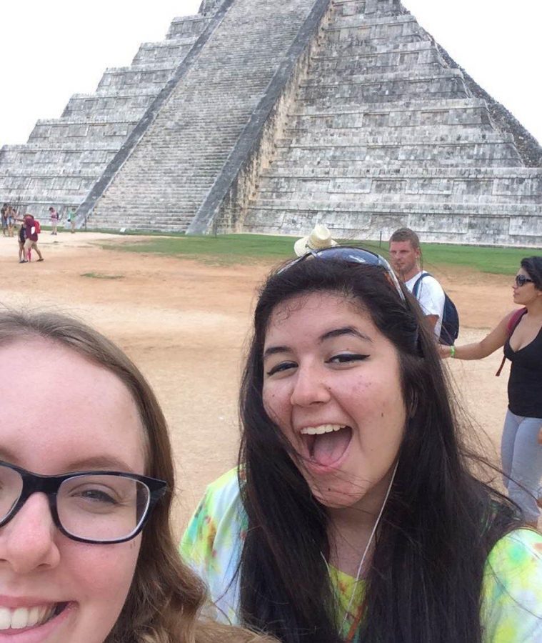 Visual senior Amelia Polyviou and fellow Girl Scout member and Stetson University student Colette Lacouture take a selfie in front of a cultural landmark during an organized trip directed by Girl Scouts of Southeast Florida (GSSEF).