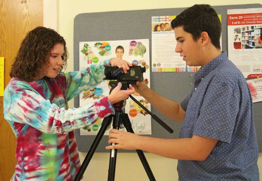 Communications freshmen Taylor DiPietro and Sebastian Fernandez work on a film during 4th period.