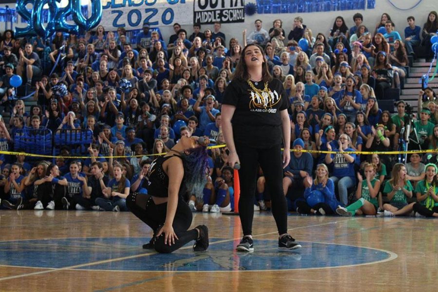Belting out the lyrics to Adele’s “Skyfall”, theatre senior Sarah Joseph (L-R) and vocal senior Makayla Forgione represented their class in the karaoke competition at today’s pep rally. The seniors won first place in karaoke.