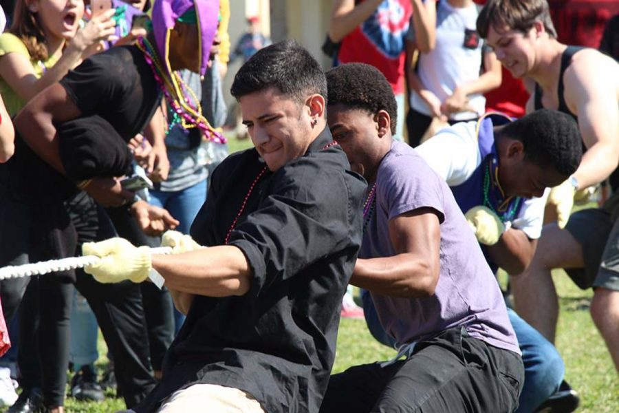 Communications senior Makoa Beck pulled his team to victory in tug-of-war. Six volunteers from each grade competed in rounds of tug-of-war each pulling the rope to the best of their abilities. There were four rounds; in the first round, juniors advanced over the freshmen, and in the second round, seniors defeated the sophomores. In the third-place match,the freshmen lost to the sophomores, and in the final round, seniors competed against juniors, and lost. 