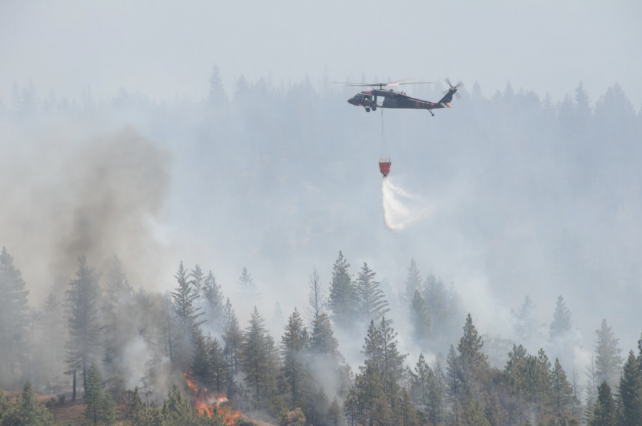 Firefighters from California and Nevada work together with support from the California National Guard to extinguish raging wildfires throughout the state. 