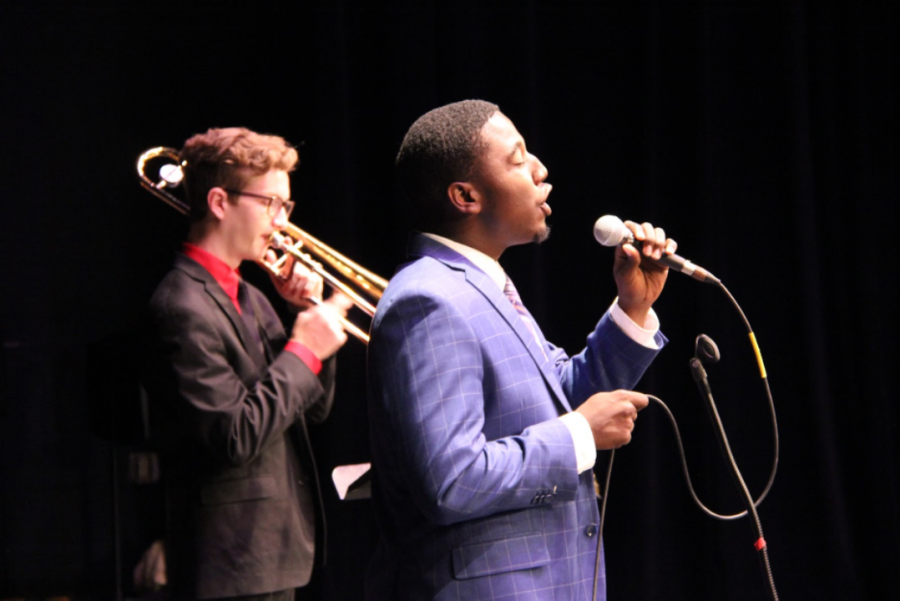 Band junior Leo Markel and vocal senior James Jean, along with the Groove Toons jazz group, perform at the Jazz Combos Concert held on Oct. 24. Vocal majors collaborated with band students in delivering a melodic and powerful performance.