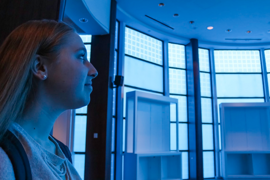 Strings senior Madison Payne takes in the details of the multi-sensory art exhibit by sound artist Stephen Vitiello at Culture Lab. The new space features two other exhibits by Vitiello which can be seen on the weekends from 11 a.m. to 6 p.m. for free. 