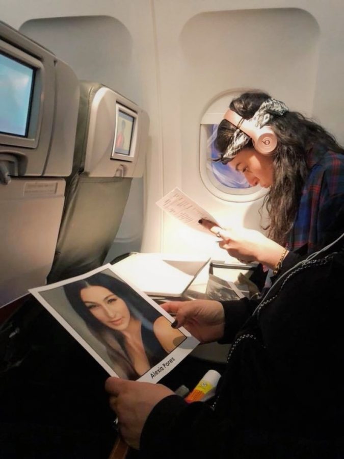 Theatre senior Alexia Pores reviews her lines on a flight to New York in preparation for her Juilliard audition.
