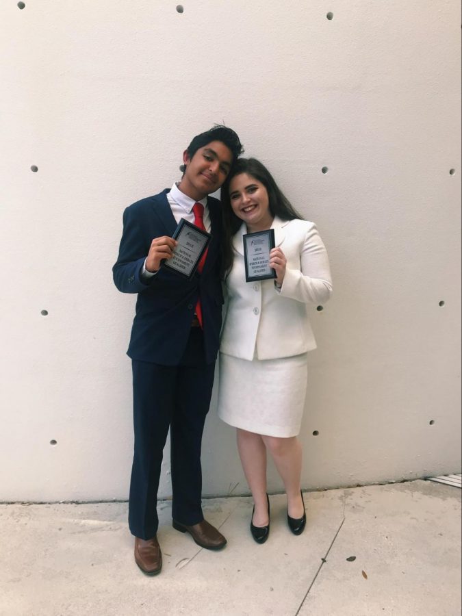 Communications+freshman+Nirmit+Chandan+poses+with+communications+senior+Maya+Levkovitz+moments+after+receiving+their+awards+for+Congressional+Debate.+Both+Chandan+and+Levkovitz+qualified+for+the+2018+National+Speech+and+Debate+Tournament+on+June+17+through+22+in+Fort+Lauderdale.%0A