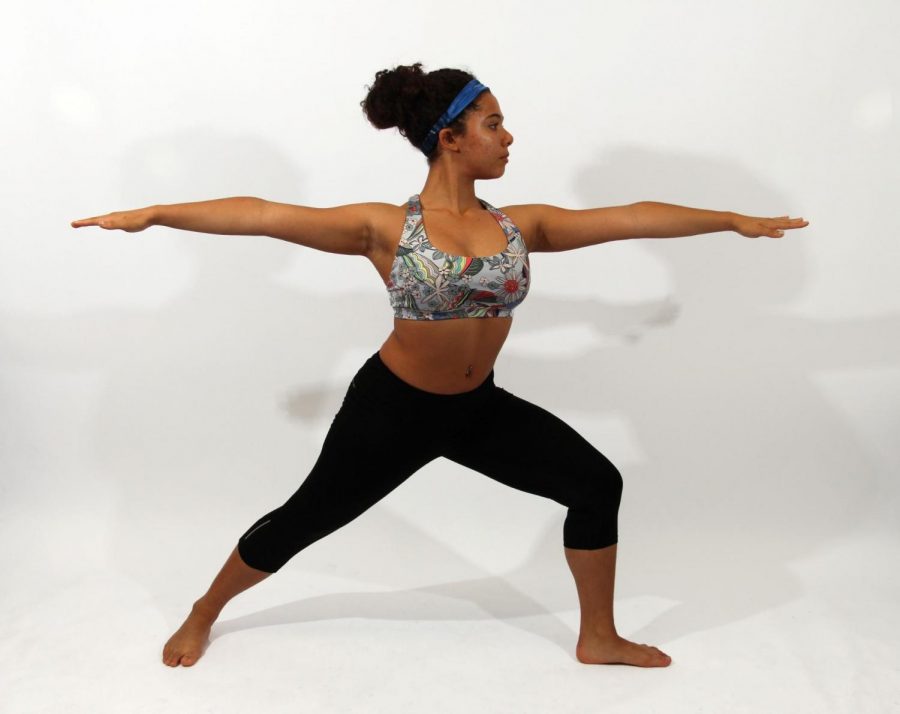Warrior II Pose - In Hindi the warrior pose is named after the Hindu warrior Virabhadra, who was an incarnation of the Hindu god Shiva.  According to YogaOutlet, Warrior II stimulates healthier digestion as well as the general toning of the body.  Since it opens the chest and shoulders, it is said to relieve backaches. 
