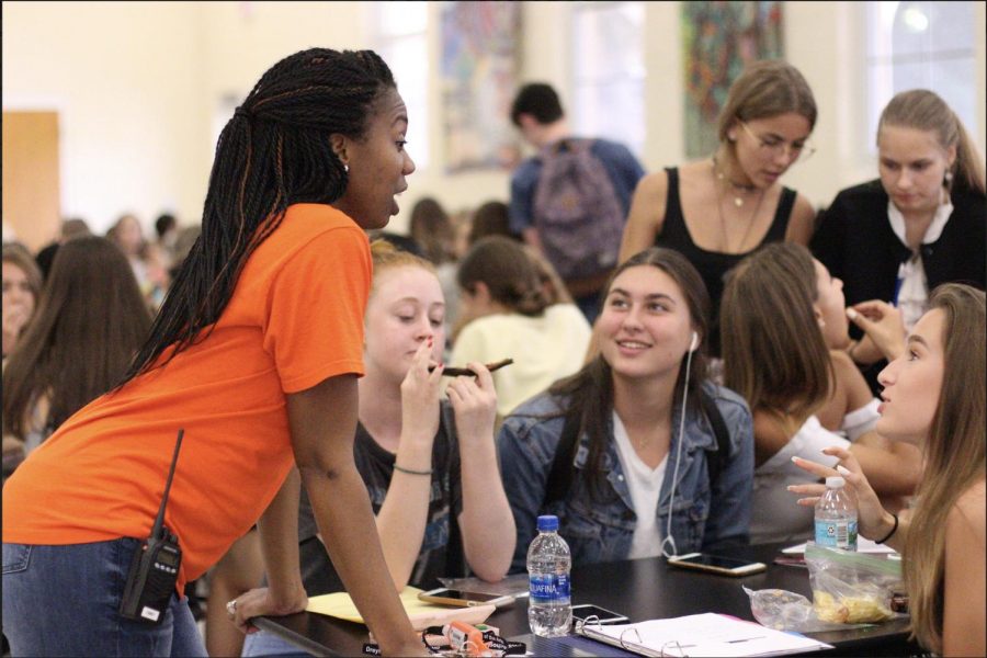 New Assistant Principal Teneisha Finney interacts with students in the cafeteria during her  supervising shift. “I worked at Atlantic [High School] for 13 years, and it was different because they didnt have arts programs that they taught at the school specifically,” Mrs. Finney said. “Its a very different environment. I loved Atlantic and I love it here and Im just excited to be here.” Mrs. Finney enforced school rules and got to know the student body in her first few weeks as a staff member.