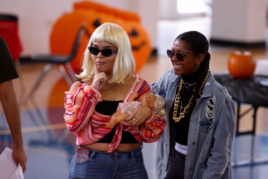 Dance seniors Mariana Mona and Gabriella Angel posed and screamed, riling up the crowd of eager students. Their costumes depicted pop culture icons Cardi B and Offset, winning the costume contest. “So I guess I have always been a pretty big Cardi fan,” Mona said. “I have always loved her, and I wanted to be something funny and different which is usually her, which is why I brought the baby, and it kind of just worked out.”