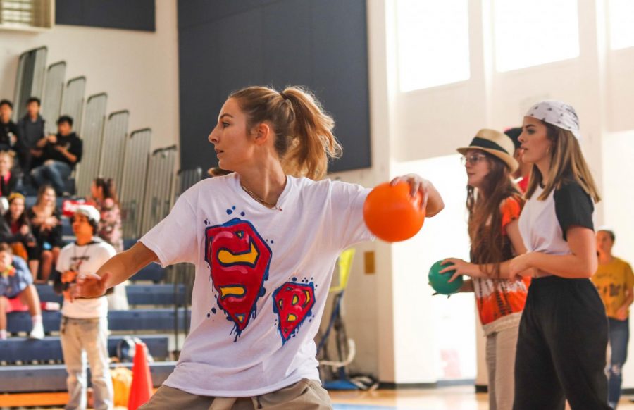 Dodgeball+in+hand%2C+visual+senior+Paige+Duffack+aims+for+her+opponents.+Backed+up+by+communications+senior+Rebecca+Nir%2C+Duffack+and+the+Class+of+2019+played+hard+against+both+the+freshman+and+sophomore+classes%2C+but+ended+up+taking+fourth+place+overall.+