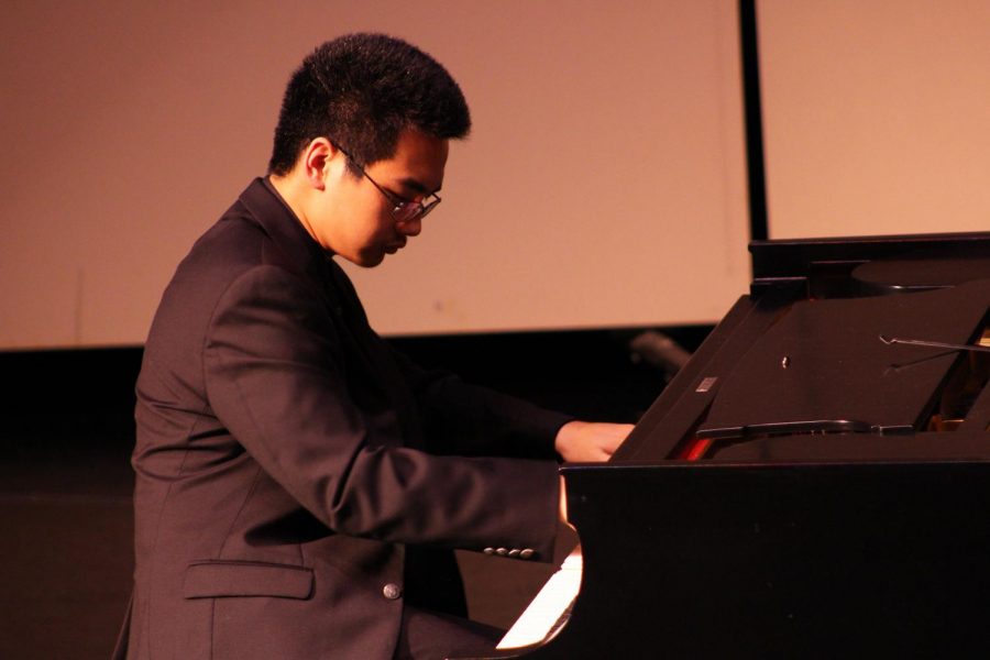 Piano sophomore Daniel Wang plays Sonata Op. 22 No. 11 in B-flat Major (Movement 1) by Beethoven. It was the second piece he played during the recital, after Prelude and Fugue in A-flat Major, BWV 862 by Bach. “In the beginning, I actually didn’t enjoy performing,” Wang said. “Eventually I came to enjoy it because I want to be able to perform music to an audience and make the audience feel what I feel when I practice.”