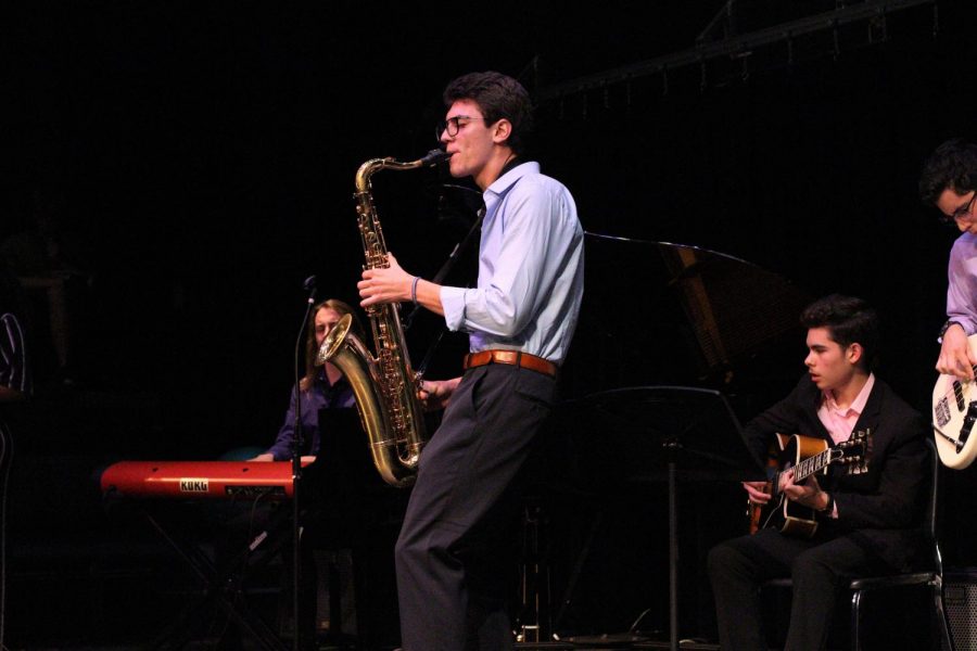 Numerous jazz students passionately play together for a concert in the Brandt Black Box Theater on March 5. They improvised upon well-rehearsed pieces to showcase their talents and hard work over the past few months. “Jazz is about improvisation, so every time that you hear a groove, its different,” Mr. Hernandez said. “The [students] surprise me. Sometimes they come up with [some]thing I never thought about myself.”