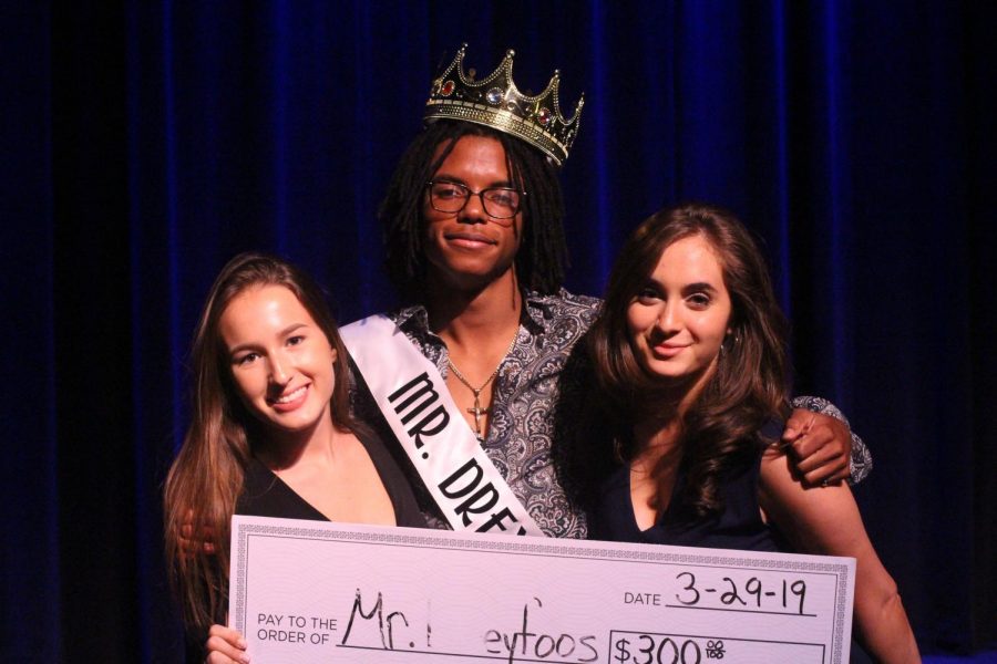 After being crowned Mr. Dreyfoos, visual senior Njari Anderson stands alongside digital media junior Kristina Ronan and communications junior Sasha Monaco. 
