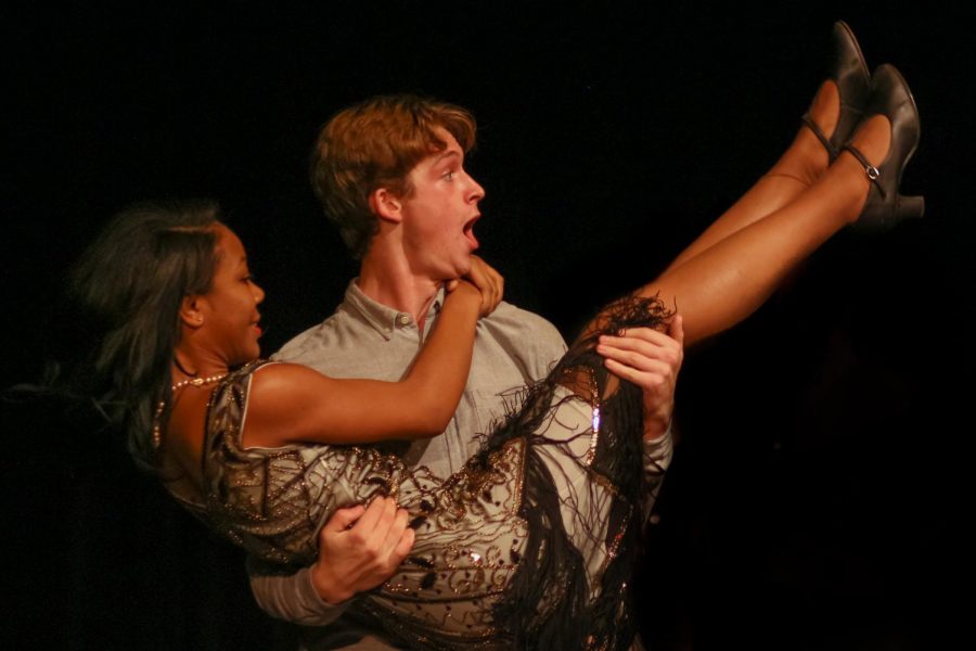 Playing love interests Benedick and Beatrice, theatre junior Cooper Musser holds theatre senior Maya Mays. In the beginning of the play, Beatrice avoided love, saying, “I had rather hear my dog bark at a crow than a man swear he loves me.” By the end of the comedy, though, the two fell in love.