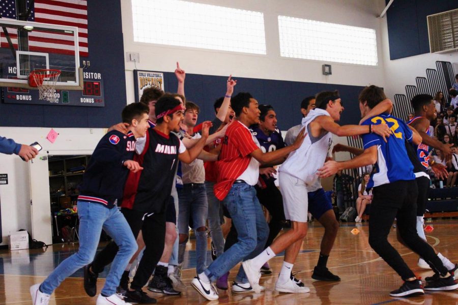 Juniors celebrate their dodgeball victory over the seniors. With first place in the game, juniors brought their total number of Spirit Week points to 40, tying with the seniors for the most points. “I think we won because we all had great teamwork,” theatre junior Christopher Hesse said. “We all were really dedicated to the cause, and we know that this is going to be the year that the juniors beat the seniors, and so we were all so devout to that one cause that we just went bananas.”
