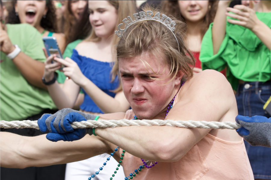 In a last round competition against the sophomores, communications senior Tommy McCabe tugs at the rope to help the senior class win the game. The seniors lost to the sophomores, leading to a final round between the sophomores and juniors. “This year [seniors] got third, and I’m a little hurt,” McCabe said. “I mean, last year, [the class of 2020] beat the seniors and we won; we got first place.”