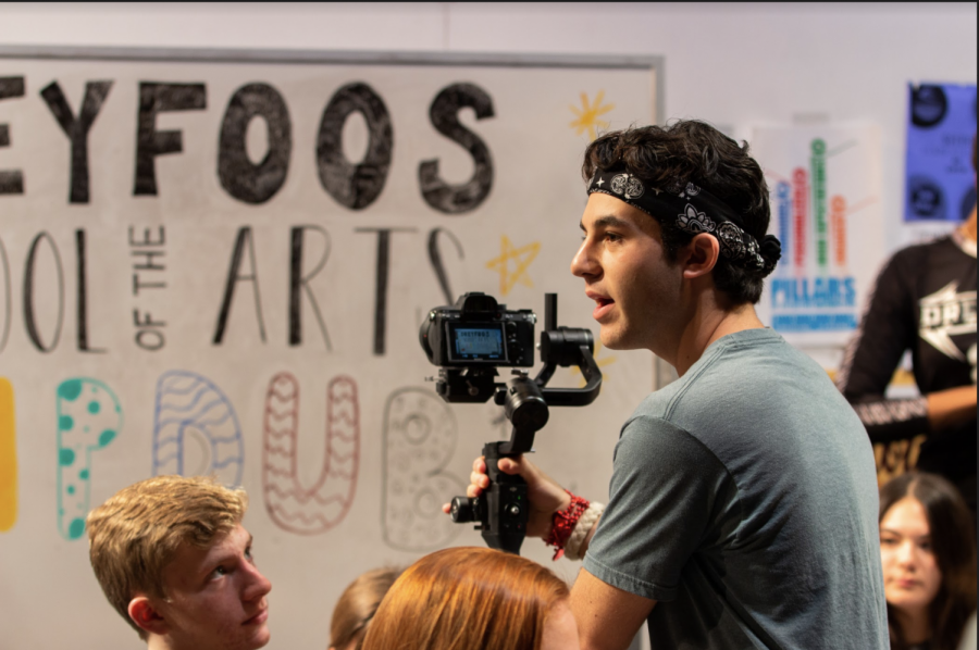 Communications junior Adam Goldstick films the first scene of Dreyfoos’ second annual Lipdub. With over a month of preparation, students came together to sing, dance, and show off their school spirit. “My ultimate goal through all this work and collaboration is to be able to showcase what Dreyfoos really is: the people, the culture, the quality of the school, and the spirit,” Goldstick said.
