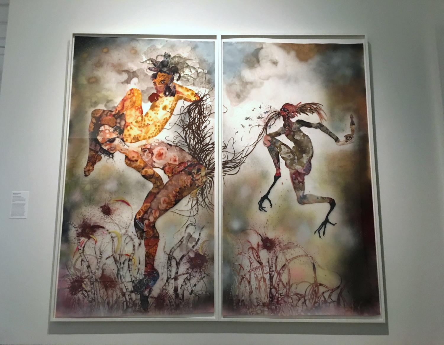 Wangechi Mutu’s piece, “Your Story, My curse,” hangs in the Norton Museum of Art.  Mutu, an African artist, used collage pieces, mylar paper, and glitter to construct her characters. “It’s pretty much all over the place, but I think that kind of speaks for her art,” theatre junior Mayah Bernstein said.  “A lot of her art reflects consumerism and… representation of African women in the media.”