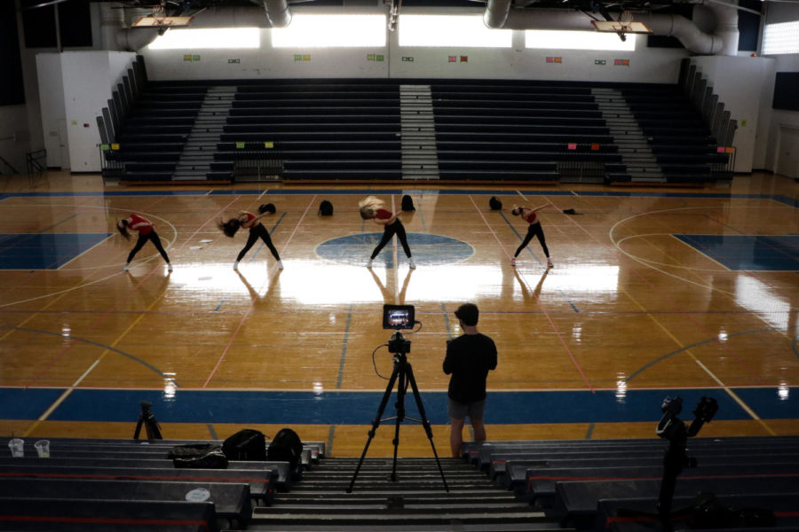 Communications senior Adam Goldstick records dance juniors Kailey Worontsoff, Lauren Hopta, Sophia Chambers, and Jacqueline Albanese as they perform the junior class pep-rally dance.