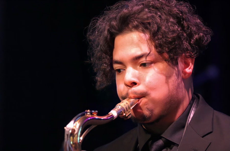 Band junior and first jazz ensemble member Nathan Delgado plays the tenor saxophone at the Dreyfoos School of the Arts Foundation Broadway Bound Luncheon. 