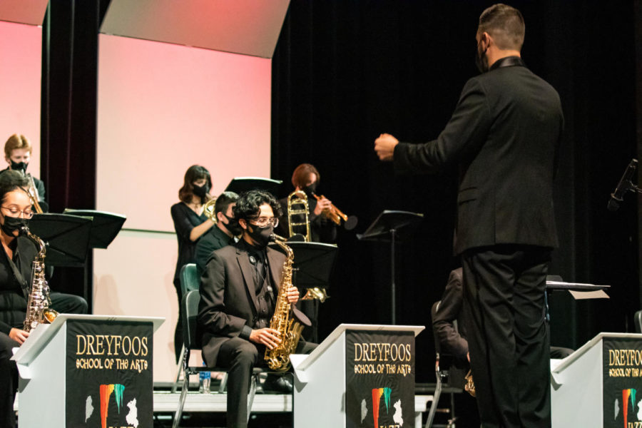 Jazz director Christopher De Leon conducts band senior Ivan Serafin, along with other performers on stage, ensuring everyone is in sync. This was Mr. De Leon’s first year on campus. “They’ve missed [performing live] for a long time. We all have missed it,” Mr. De Leon said. “It puts an exclamation point at the end of the year that we are finally seeing ourselves get back to normal.”