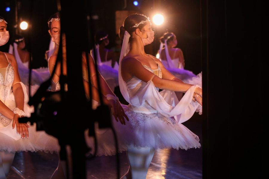 Surrounded by her fellow performers during the dress rehearsal for the Nov. 4 show, dance junior Natalie Apuzzo waits backstage for her part in the classical ballet piece “La Bayadère.” After two years away from the Meyer Hall stage, all dance majors finally had the opportunity to showcase their craft.