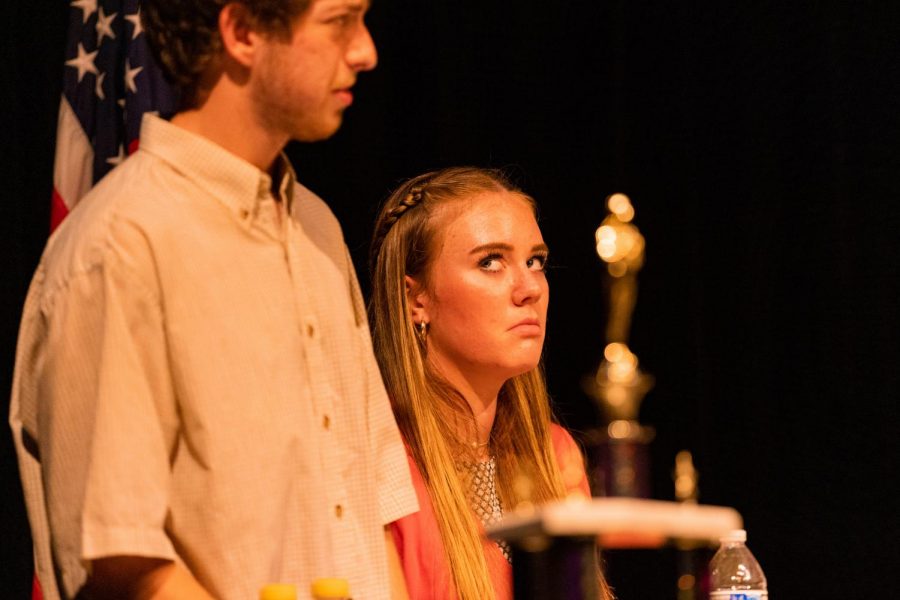 Theatre senior Lily Counihan, who plays Rona Lisa Peretti, stares as Reiter reprimands a contestant for not spelling their word in the given timeframe.