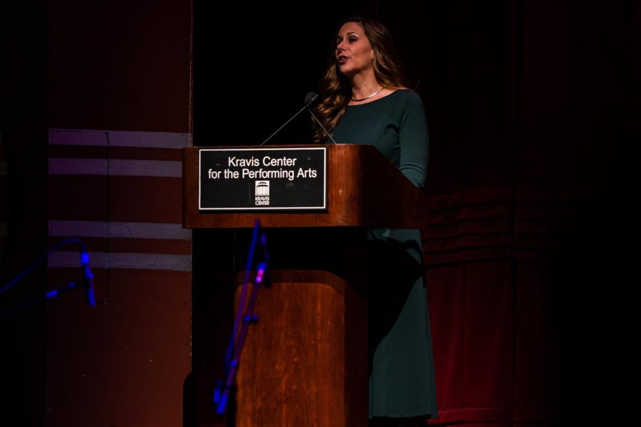 Principal Blake Bennett introduces the performance, thanking numerous benefactors and staff members, especially the music directors who created and oversaw the production. During the evening show, she took this opportunity to introduce author James Patterson, who has continuously supported the concert for the last nine years.