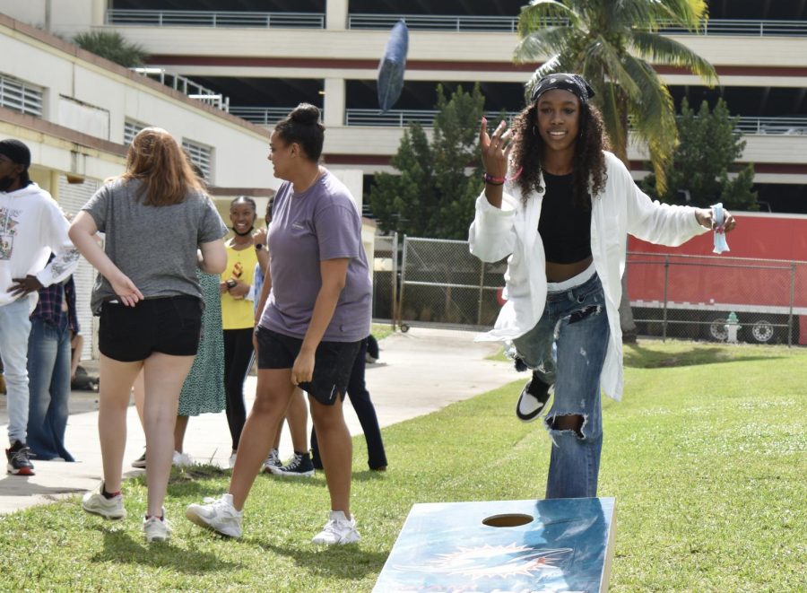 Dance junior Jonelle Brinkley plays bean bag toss. “My favorite thing about the BSU block party was that I was able to share and celebrate my culture with other students at the school in a fun and entertaining way,” Brinkley said. “I love that everyone was able to enjoy themselves in a safe space.”