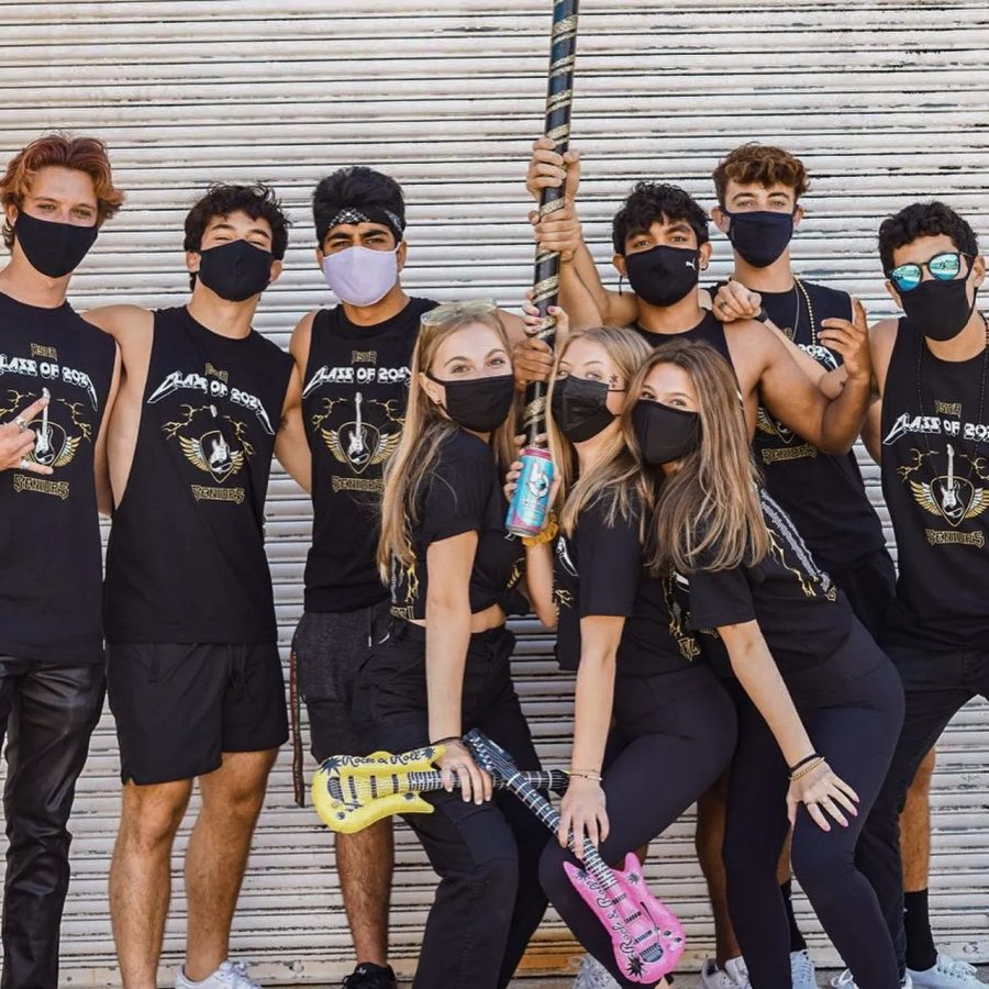 Class of 2021 seniors pose with the Spirit Stick on campus after emerging victorious in Spirit Week 2020.