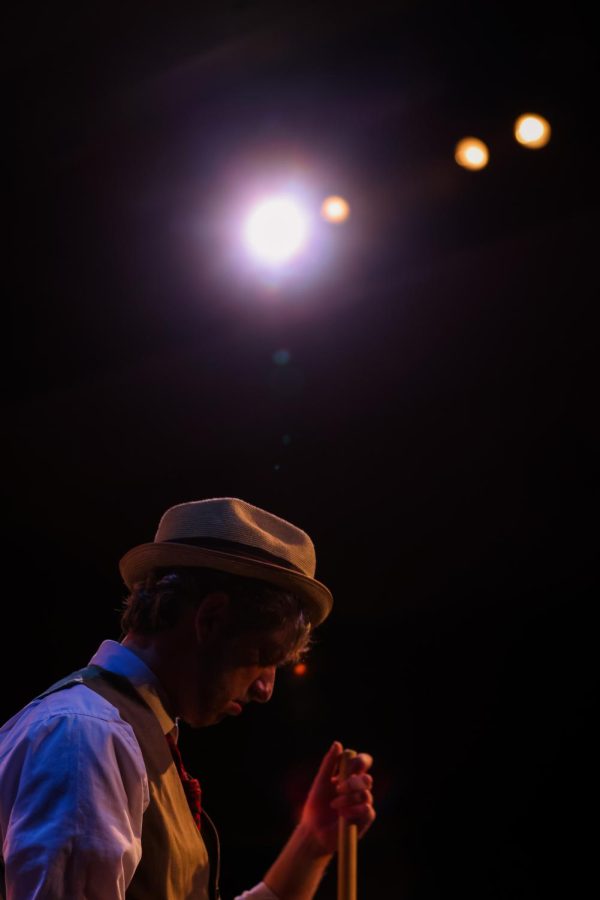 During the opening number “Skid Row (Downtown),” Mr. Mushnik (played by theatre senior Daniel Reiter) leans on a broom, contemplating his life in the decrepit town.