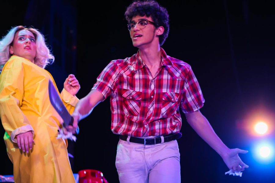 Seymour plots the death of Audrey II, detailing to Audrey (played by theatre senior Grace Trainor) the various methods he planned on using to ensure it would be killed, from stabbing it with a machete to harming it with rat poison.