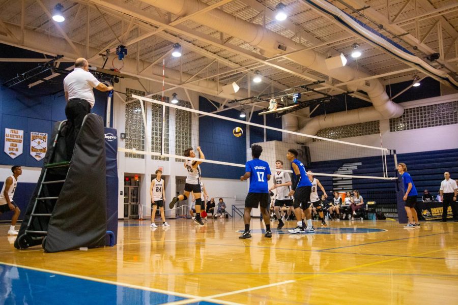 Students and parents sigh as the ball hits the net. They reacted with the same passion throughout the game against Lake Worth Christian School on Feb. 28. 