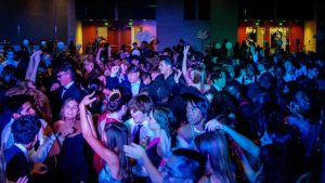 Students celebrate on the dance floor at the school’s first prom in two years.