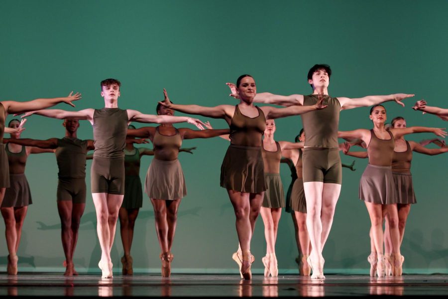 Junior dance majors twirl on pointe as they perform “Evergreen,” a piece in “Unity,” the fall dance show that opened on Friday, Nov. 11. The group has been preparing since September for opening night. 