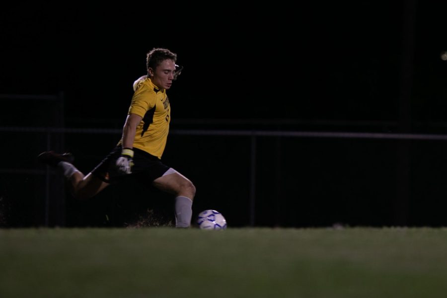 Lining up his shot, visual junior Justin Olive-Blanco kicks the ball back into the game after it was sent out of bounds. Olive-Blanco blocked all of Twin Lakes’ shots, despite serving as a substitute goalie after the starting goalie was injured during the previous game.